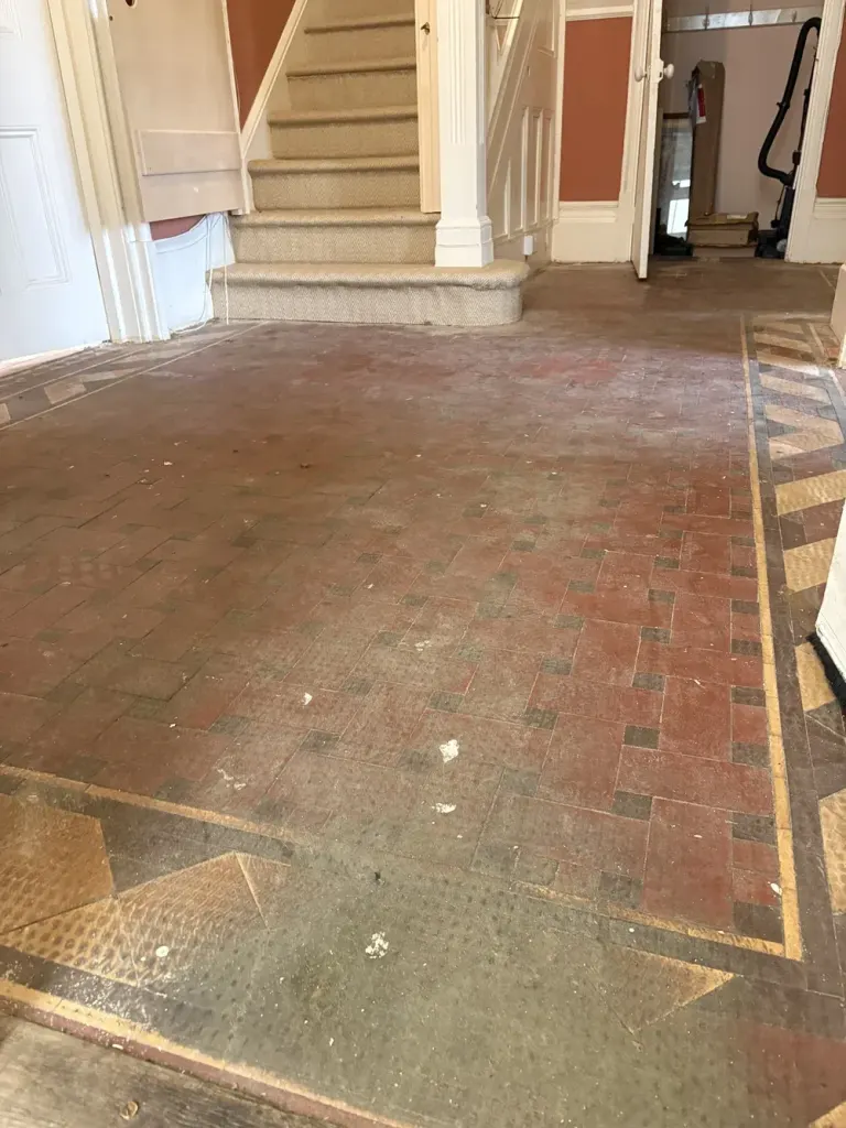 Victorian hallway tiles uncovered after forty years, before restoration